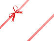 red thin ribbon with bow composition
