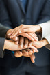 © michaeljung - business people hands together