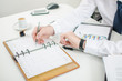 © thodonal - Businessman looking at his watch