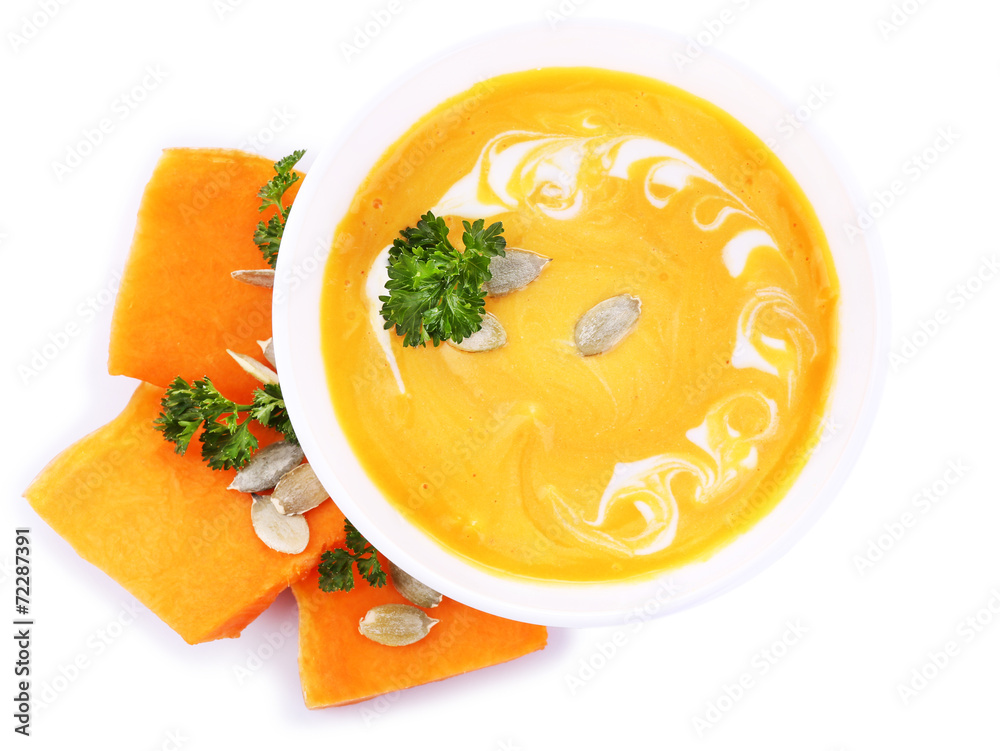 Pumpkin soup and fresh pumpkin slices isolated on white