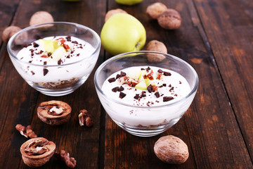 Canvas Print - Oatmeal with yogurt in bowls, apples and walnuts