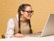 Female nerd at the laptop