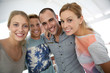 © goodluz - Portrait of cheerful group of friends