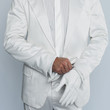 Man in White Suit wearing White Glove