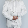 Man in White Suit wearing White Glove
