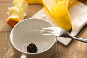 Wall Mural - table remnants after a consumed healthy breakfast