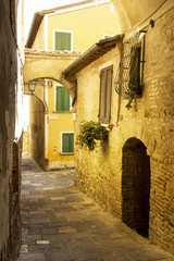 Wall Mural - Old vintage street in an Italian village in Tuscany