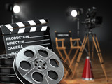 Fototapeta  - Video, movie, cinema concept. Retro camera, reels, clapperboard