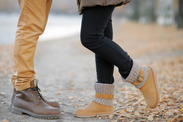 Wall Mural - Male and female legs during a date