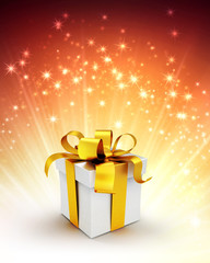 gift box on shiny gold background