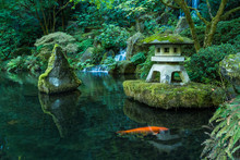 A Lantern And Waterfall In The Portland Japanese Garden