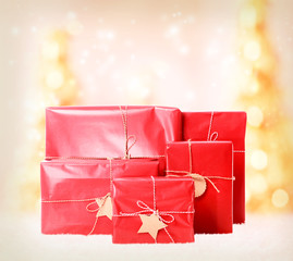 Wall Mural - Gift boxes on Christmas trees background