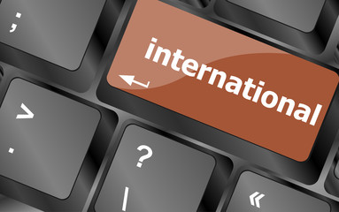 Poster - computer keyboard with word international, education concept
