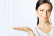 © vgstudio - Business woman showing, at office