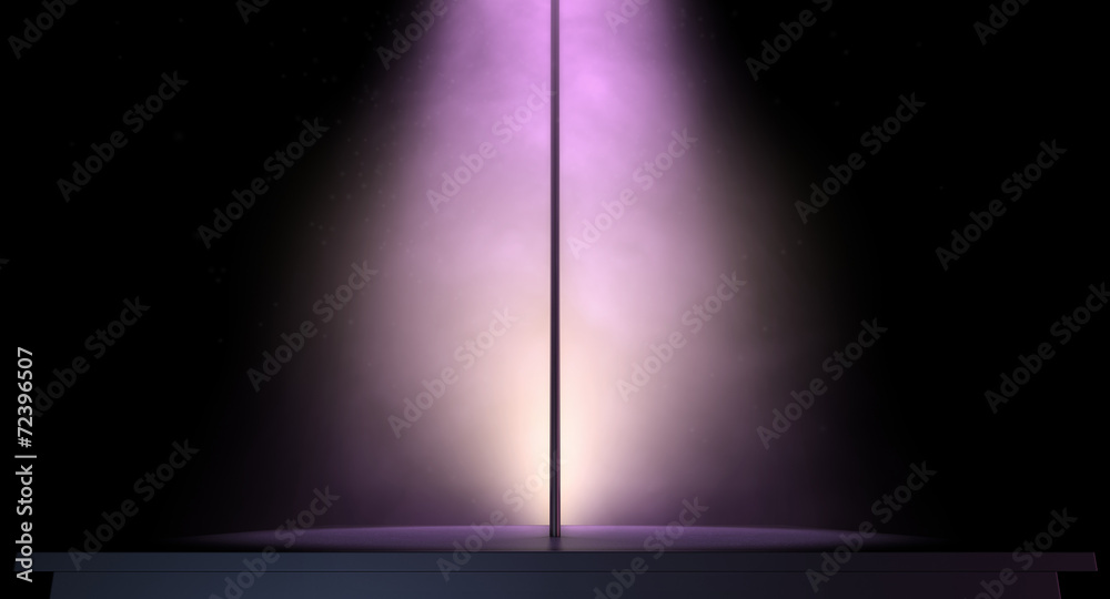 stripper pole on a stage lit by a single spotlight - obrazy, fototapety, plakaty 