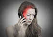 © pathdoc - Side profile girl on the phone with headache red area of pain