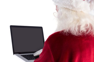 Poster - Santa Claus uses a laptop