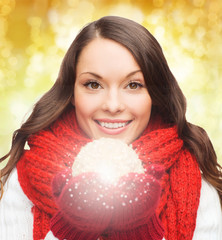 Sticker - smiling woman in winter clothes with snowball