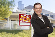© Andy Dean - Mixed Race Woman in Front of House and Sold Sign
