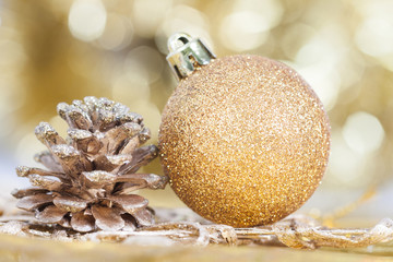 Christmas background with closeup on decorations:  golden chris