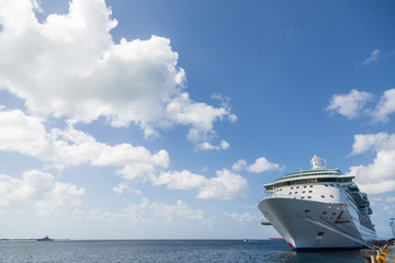 Wall Mural - Cruise Ship Anchored at Pier with Beautiful Sky