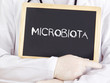 Doctor shows information: microbiota