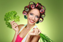 Beautiful Girl In Hair Curlers On Green Background