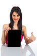 © fotocerva - Slim girl showing tablet screen