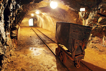 Wall Mural - Underground train in mine, carts in gold, silver and copper mine