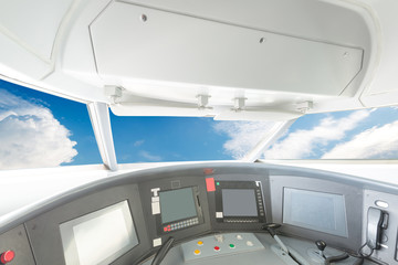 plane cockpit and cloudy sky