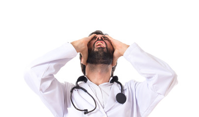 Wall Mural - Frustrated doctor over isolated white background