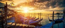 Panoramic View Of Venice With Gondolas At Sunrise