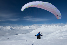 Paraglider In Winter Mountains Of Georgia