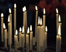 Thin White Candles In Catholic Church