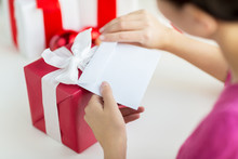 Close Up Of Woman With Letter And Presents