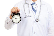 Asian Male Doctor Show A Clock