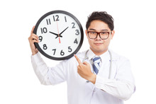 Asian Male Doctor Point To A Clock