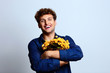 © Drobot Dean - Happy man hugging bucket with flowers
