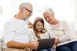© Syda Productions - smiling family with tablet pc at home