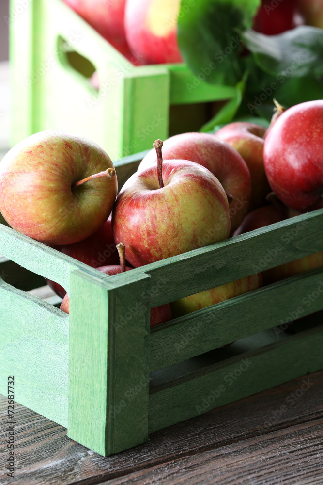 Juicy apples in box, close-up