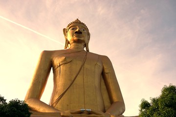 giant golden image of Buddha with the sky 2