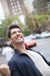 © goodluz - Man expressing happiness and success in the street
