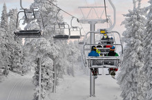 Ski Chair Lift With Skiers. Ski Resort In Ruka, Finland