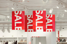 Sale Signs In A Clothing Store