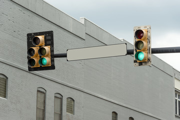 Blank Street Sign With Green Light