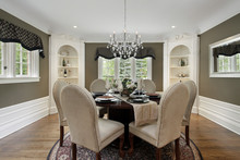 Dining Room With White Cabinetry