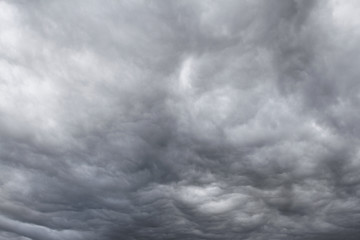 Wall Mural - Dramatic grey storm clouds sky