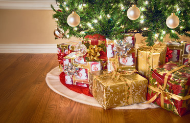 Wall Mural - Gifts under Christmas tree, closeup