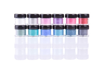 Wall Mural - Two rows of loose eye shadows in plastic jars