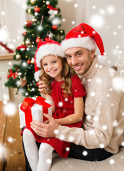 Poster - smiling father and daughter holding gift box